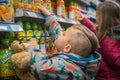 Kids shopping for sweet soft drinks