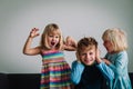 Kids shouting, brother and sisters tired of staying home, family problems Royalty Free Stock Photo