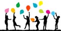 Kids silhouettes playing with colored balloons Royalty Free Stock Photo