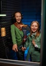 Kids singing in record studio