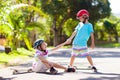Kids with skate board. Skateboard fall and injury