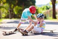 Kids with skate board. Skateboard fall and injury