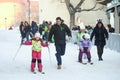 Kids skiing in city center