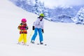 Kids skiing in the mountains