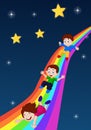 Kids Sliding Down a Rainbow Royalty Free Stock Photo