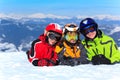 Kids in snow on mountaintop