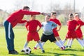 Kids soccer football - children players exercising before match