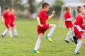 Kids soccer football - children players exercising before match