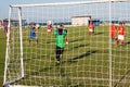 Kids soccer football - young children players match on soccer field near a sea Royalty Free Stock Photo