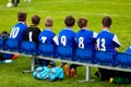 Kids Soccer Team on a Bench. Children Football Team Players