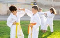 Kids sparring during karate training