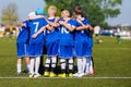 Kids Sport Team Gathering. Children Play Sports. Boys in Sports Jersey Uniforms Having Shout Team Royalty Free Stock Photo