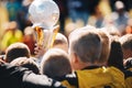 Kids Sport Team with Trophy. Kids Celebrating Football Championship Royalty Free Stock Photo