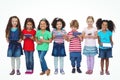 Kids standing together holding tablets and phones Royalty Free Stock Photo