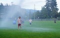 Kids staying cool in the summer heat.