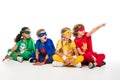 Kids in superhero costumes