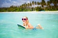 Kids surf on tropical beach. Vacation with child Royalty Free Stock Photo