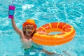 Kids swim swimming pool. Summer vacation concept. Summer kids portrait in sea water on beach. Blue water poolside Royalty Free Stock Photo