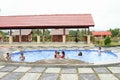 Kids swimming in clothes in entertainment park Manneken