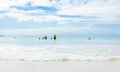 Kids Swimming on Fish Hoek beach on a cloudy day