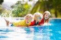 Kids in swimming pool. Children swim. Family fun Royalty Free Stock Photo