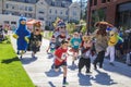 Kids and team mascots dash in charity race