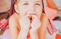 Kids teeth. Smiling girl holding missing tooth. Funny face close up. Royalty Free Stock Photo