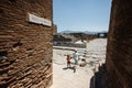 Kids tourist walking at Pompeii ancient city, Italy