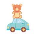 Kids toy, teddy bear sitting on blue car toys Royalty Free Stock Photo