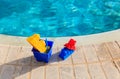 Kids toys at beach resort near the pool Royalty Free Stock Photo