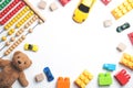 Kids toys frame on white background. Top view. Flat lay Royalty Free Stock Photo