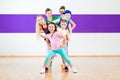 Kids train Zumba fitness in dancing school