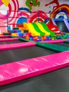 Kids trampoline and soft cubes in children playground indoor Royalty Free Stock Photo