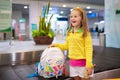 Kids travel and fly. Child at airplane in airport Royalty Free Stock Photo