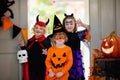 Kids trick or treat. Halloween. Child at door Royalty Free Stock Photo