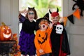 Kids trick or treat. Halloween. Child at door Royalty Free Stock Photo