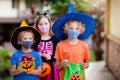 Kids trick or treat. Halloween in face mask Royalty Free Stock Photo