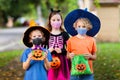 Kids trick or treat. Halloween in face mask Royalty Free Stock Photo