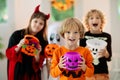 Kids trick or treat. Halloween fun for children Royalty Free Stock Photo