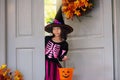 Kids trick or treat. Halloween. Child at door Royalty Free Stock Photo