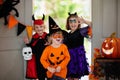 Kids trick or treat. Halloween. Child at door Royalty Free Stock Photo