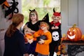 Kids trick or treat. Halloween. Child at door Royalty Free Stock Photo