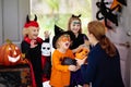 Kids trick or treat. Halloween. Child at door Royalty Free Stock Photo