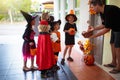 Kids trick or treat. Halloween. Child at door Royalty Free Stock Photo