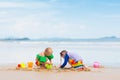 Kids on tropical beach. Children playing at sea Royalty Free Stock Photo