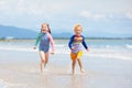 Kids on tropical beach. Children playing at sea Royalty Free Stock Photo