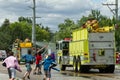 Kids trying to spray the fire fighters with water