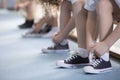 Kids tying sport shoes close-up