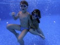 Kids underwater in the pool Royalty Free Stock Photo