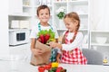 Kids unpacking the groceries